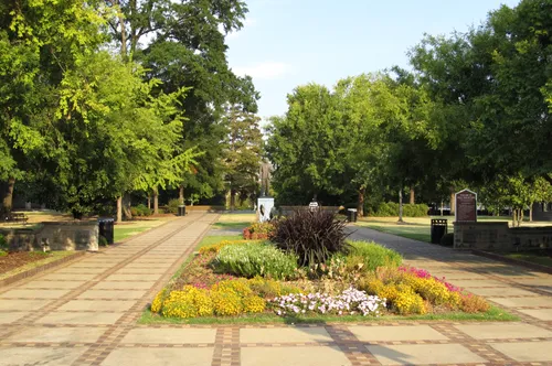 Colorful flower beds between the pathways through the historic grounds