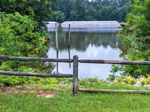 Rustic wooden fence along Black Warrior River