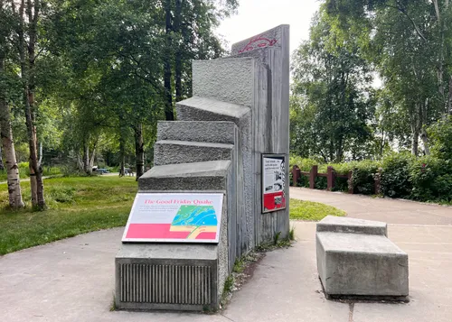 This concrete monument features several information boards