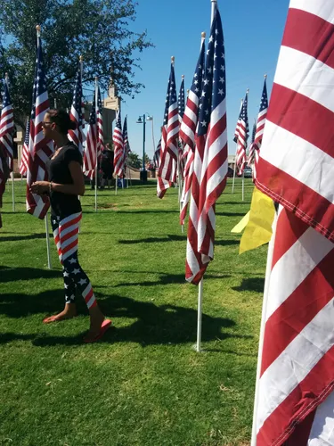 American flags stand in rows at the Tempe Healing Field memorial event