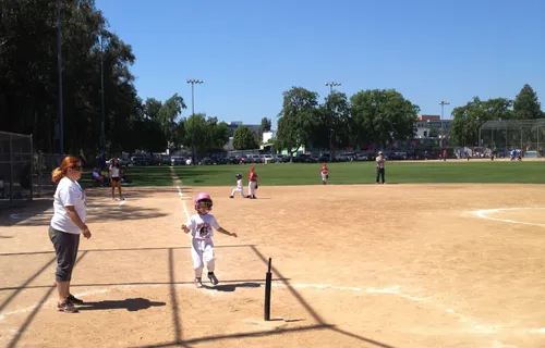 Young baseball players practicing at one of the ballfields on a sunny day