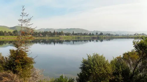 Peaceful waters reflect the surrounding landscape