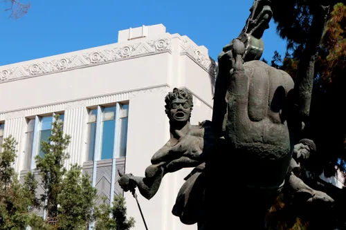 Bronze statue of David of Sassoon beside the Hall of Records building