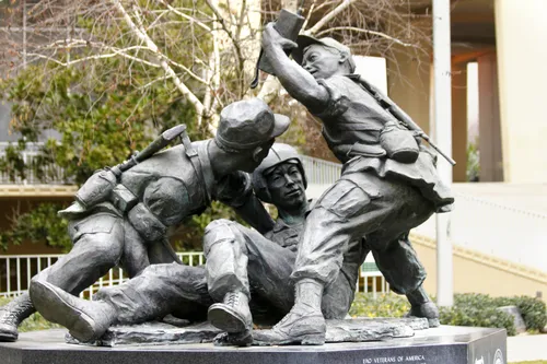 Lao Hmong American War Memorial depicting soldiers evacuating a downed pilot