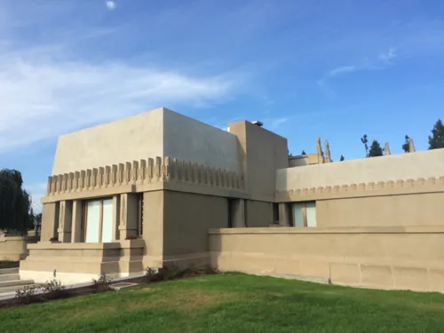 Geometric forms and horizontal lines define the building's western facade
