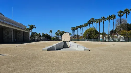 Michael Heizer's Levitated Mass features a massive boulder suspended above a 456-foot concrete trench