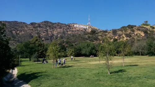 Open green space with trees offers views of the Hollywood Hills
