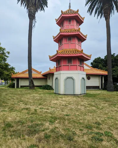 This red multi-tiered pagoda rises prominently in the park
