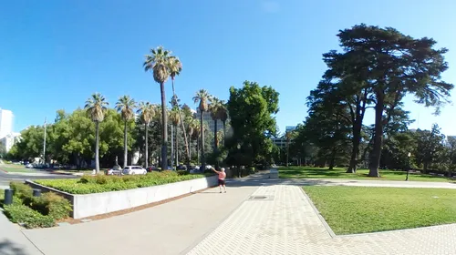 Walkways stretch through a sunny section near the Capitol building