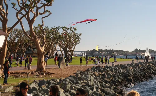 Kite flying along the rocky waterfront at Embarcadero Marina Park