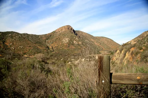 Rugged mountain peaks visible from the trail
