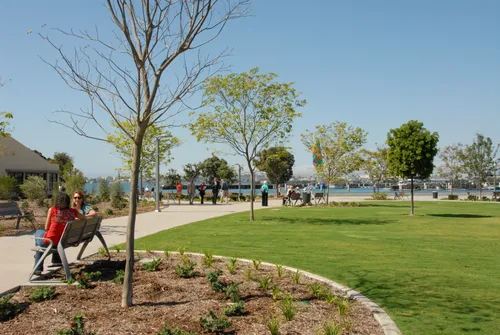 Looking westward across green lawns toward San Diego Bay
