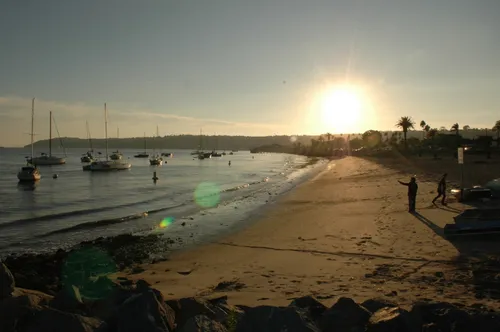 Sunset casts golden light over Grace Beach shoreline