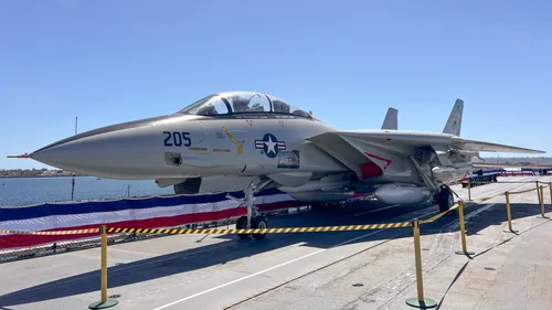 Fighter jet displayed on the deck of USS Midway Museum next to the park