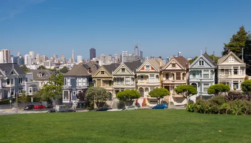 The famous Painted Ladies with downtown skyscrapers in background