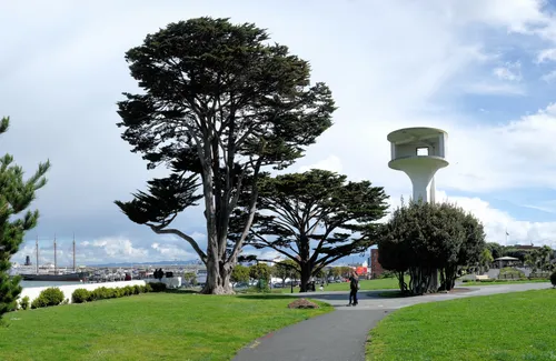 Walking paths and green lawns overlook the bay