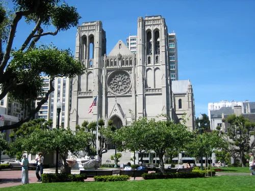 Grace Cathedral's Gothic facade rising above the manicured lawns of Huntington Park