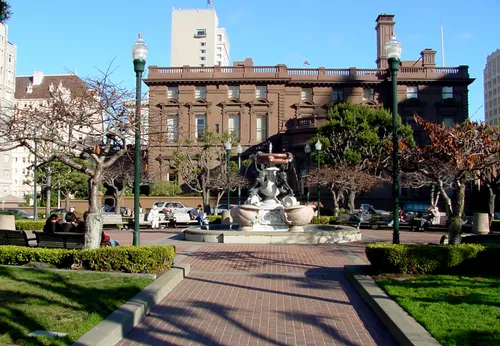 Brick pathways meet at the park's central fountain