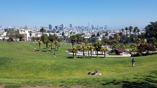 Grassy hillside offering panoramic views of the San Francisco skyline