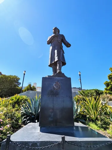 Miguel Hidalgo Y Costilla statue standing tall against the blue sky