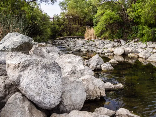 Rocky creek bed with boulders along Alamitos Creek