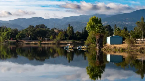 Afternoon light over the lake's mirror-like surface