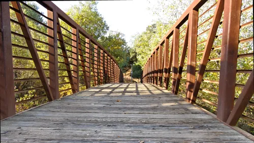 Wooden footbridge spanning across Alamitos Creek