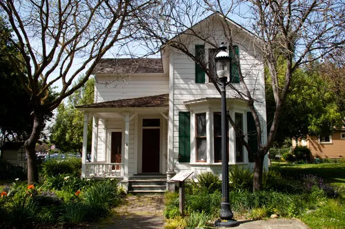 Charming white Victorian house preserves early California architectural style