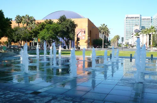 A large water feature is located in the center of the park