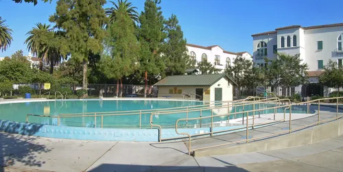 The park's community swimming pool under clear blue skies