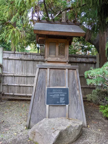 Wooden structure with bamboo fence backdrop