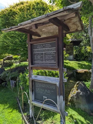 Informational sign details garden features for visitors