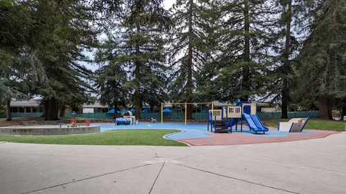 Children's playground area with blue play structures