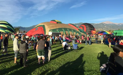Large hot air balloons ready for launch at Memorial Park's annual festival