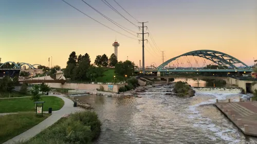 Evening view of the park with Speer Boulevard bridge on the right
