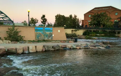 Rushing waters of South Platte River at dusk
