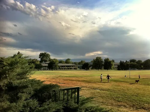 Dramatic sky over the open field at Cranmer Park