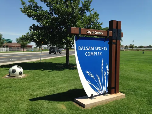 The Balsam Sports Complex sign on the park's well-kept grounds