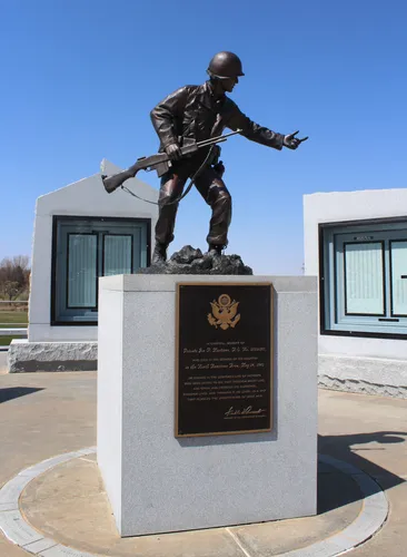 A bronze statue honors Private Joe P. Martinez