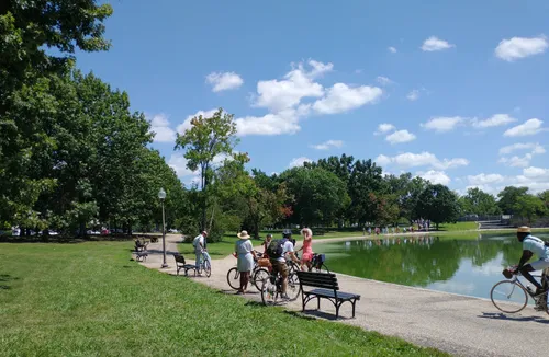 Visitors enjoy the green space surrounding Constitution Gardens Pond