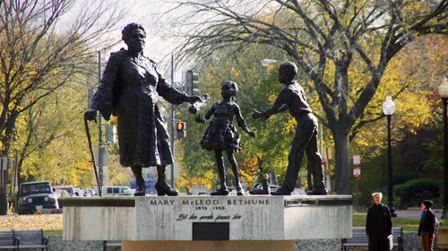 This memorial shows Mary McLeod Bethune handing a legacy scroll to two children