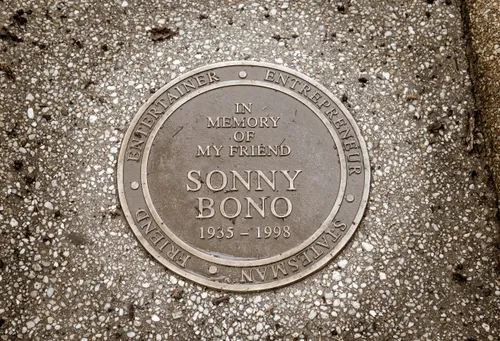 A bronze memorial plaque at the park's entrance honors Sonny Bono