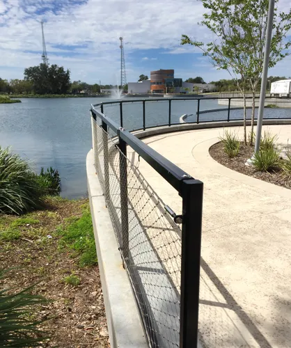 Curved waterfront walkway by the park's lake