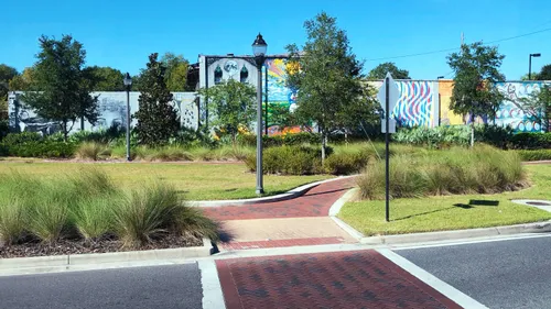 Intersection of walking paths surrounded by native grasses