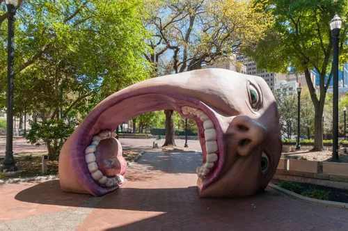 Unique face sculpture inside the park