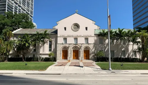 The First Presbyterian Church is a late example of Mediterranean Revival architecture, built in 1949