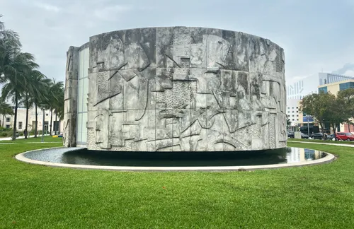 The Story of Man relief adorns the circular Rotunda in Collins Park