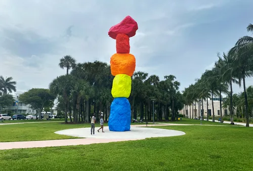 Towering rainbow-colored stack of boulders forms Ugo Rondinone's Miami Mountain sculpture