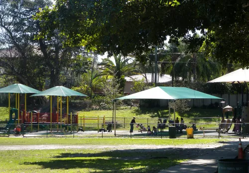 Playground with umbrellas offering respite from Miami sun