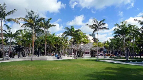 Lush trees and green lawns form tranquil spaces in the park